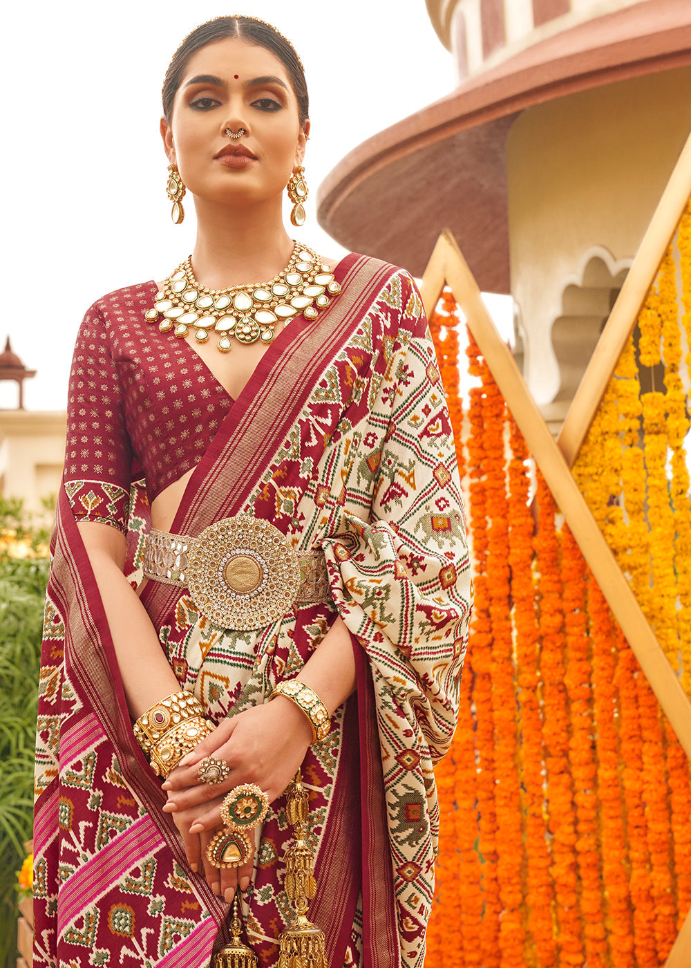 Nvajo White and Brown Printed Patola Silk Saree