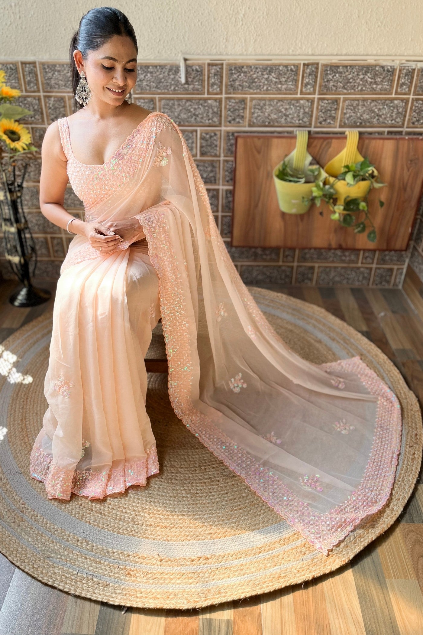 Peach Carnations Embroidery Georgette saree