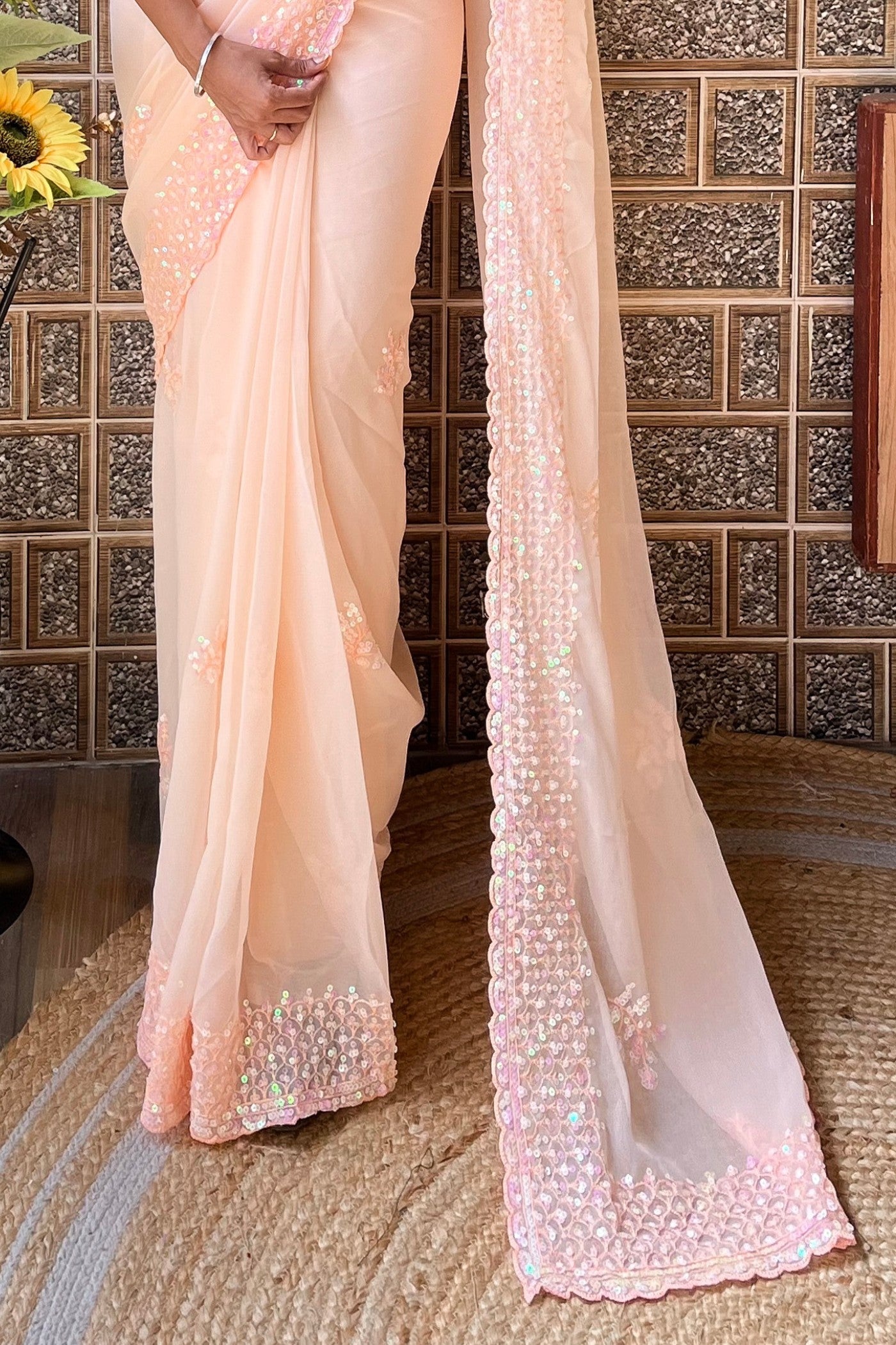 Peach Carnations Embroidery Georgette saree