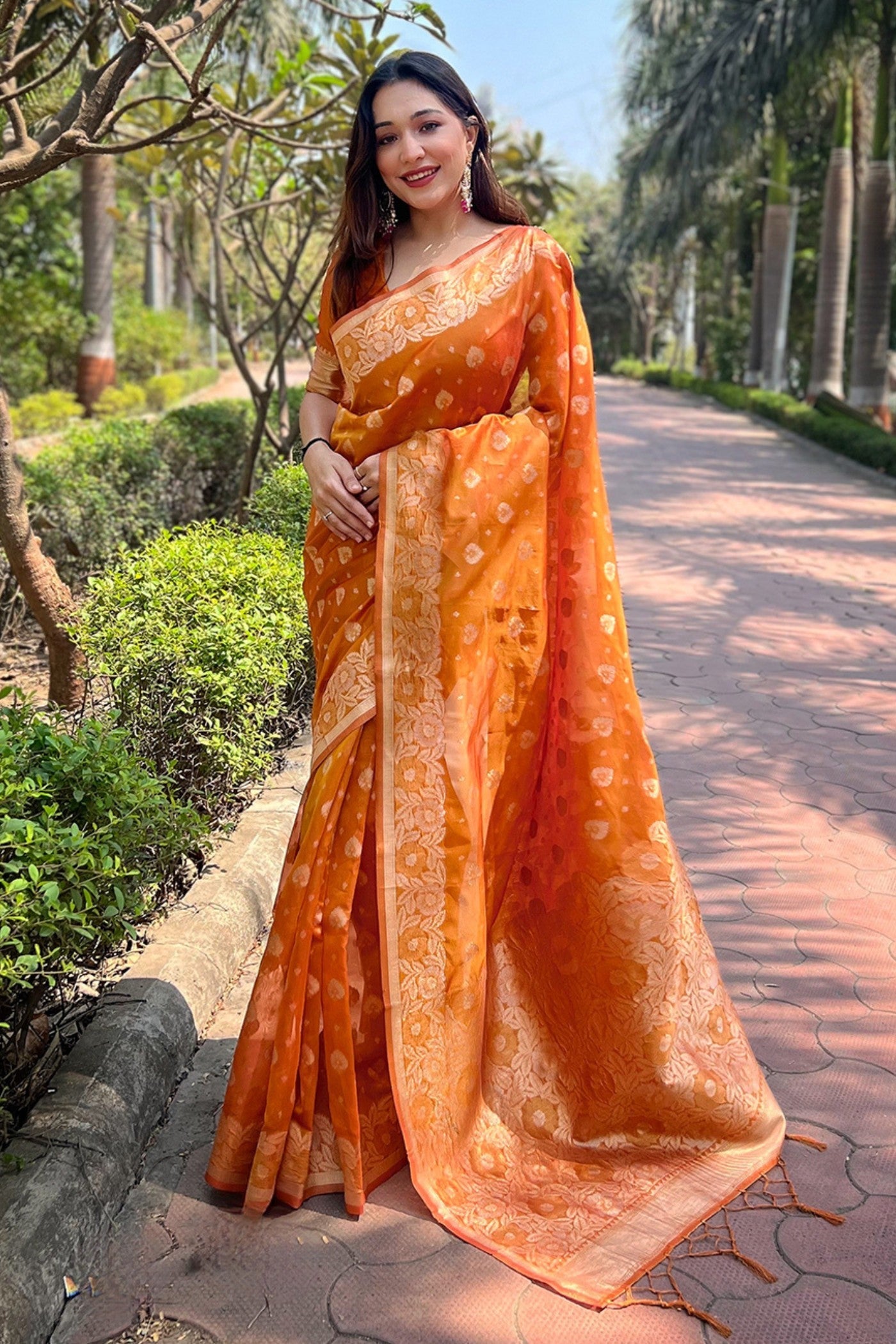 Tan Orange Zari Woven Organza Saree