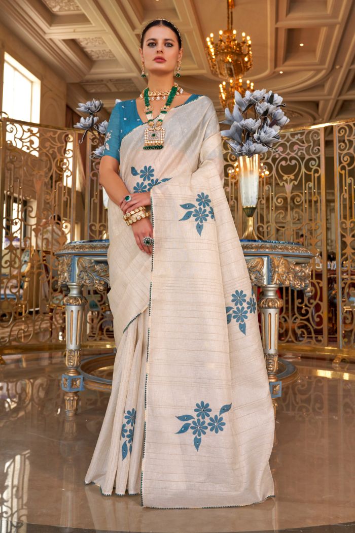 Albescent White and Blue Woven Tussar Floral Silk Saree