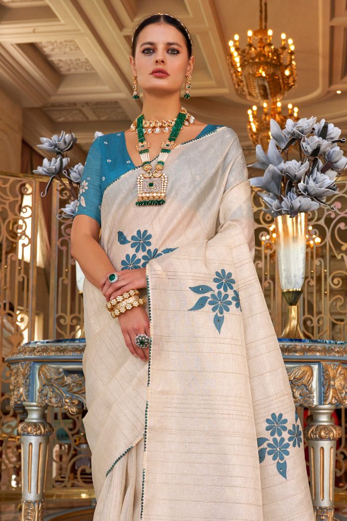 Albescent White and Blue Woven Tussar Floral Silk Saree