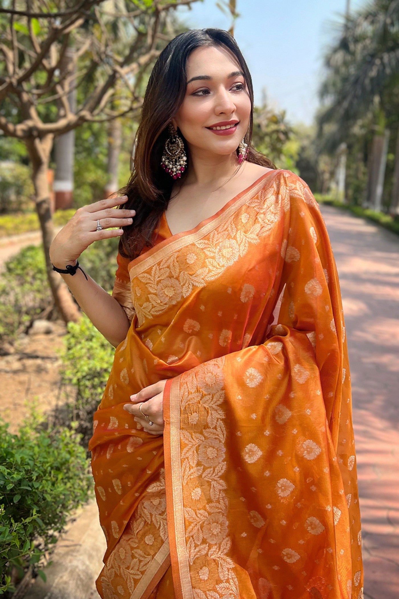 Tan Orange Zari Woven Organza Saree