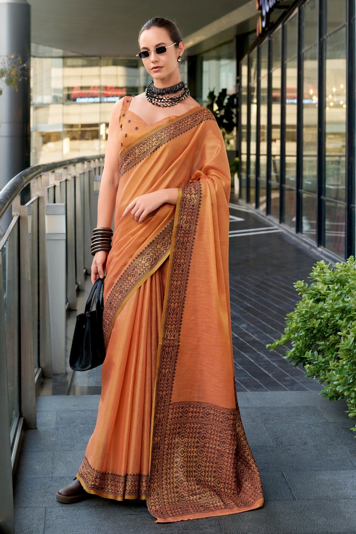 Tiget Orange Linen Tissue Silk Saree