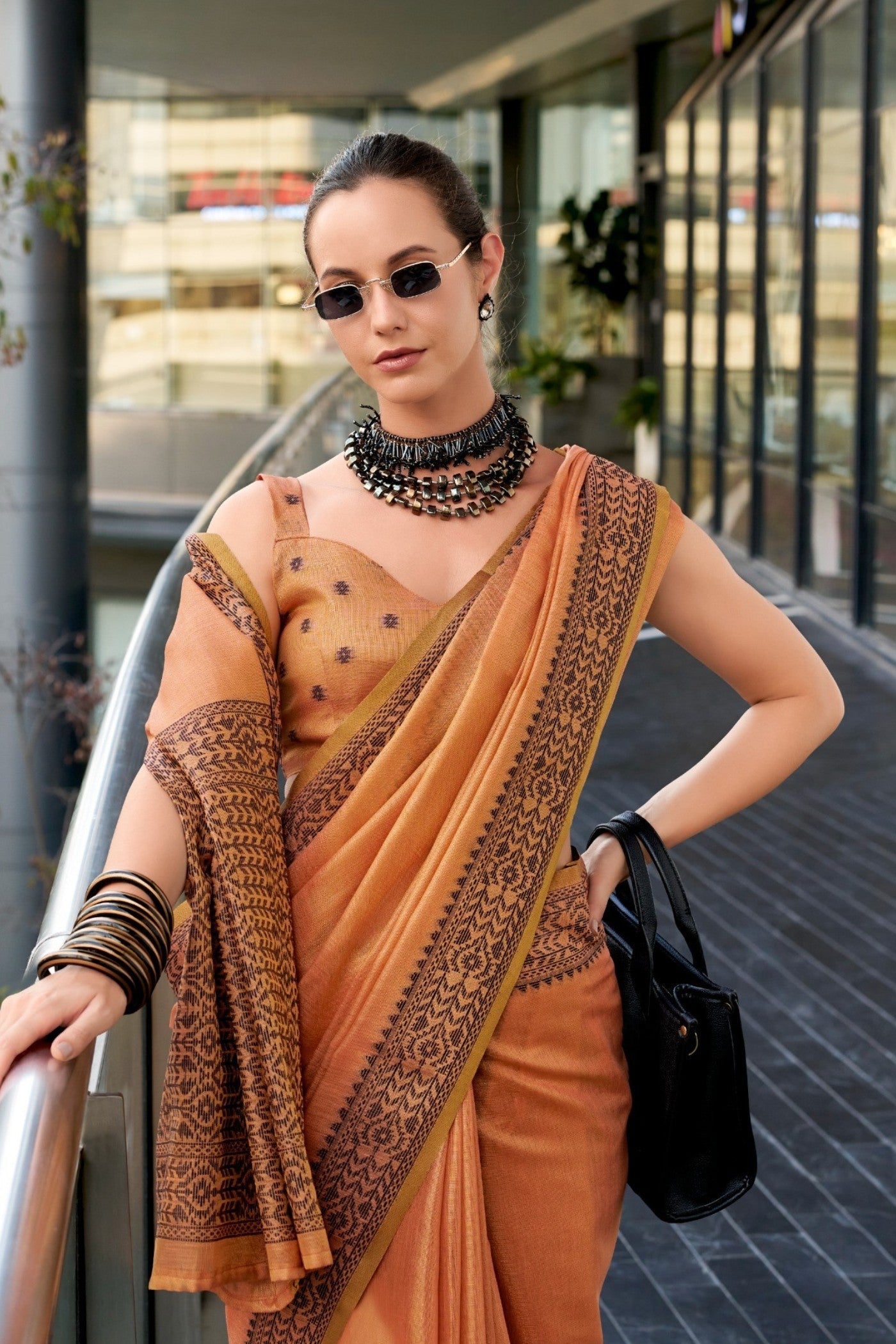 Tiget Orange Linen Tissue Silk Saree