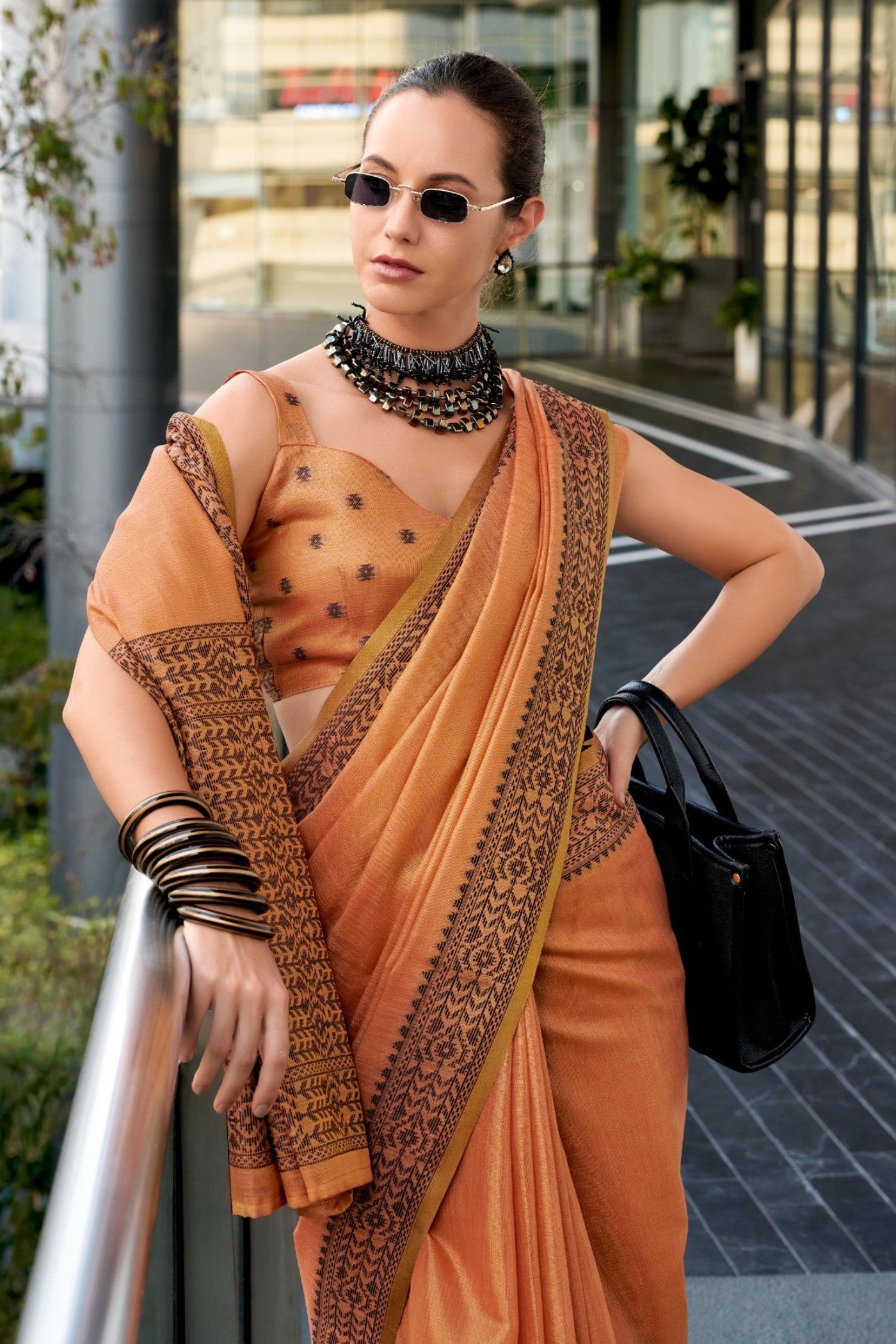 Tiget Orange Linen Tissue Silk Saree