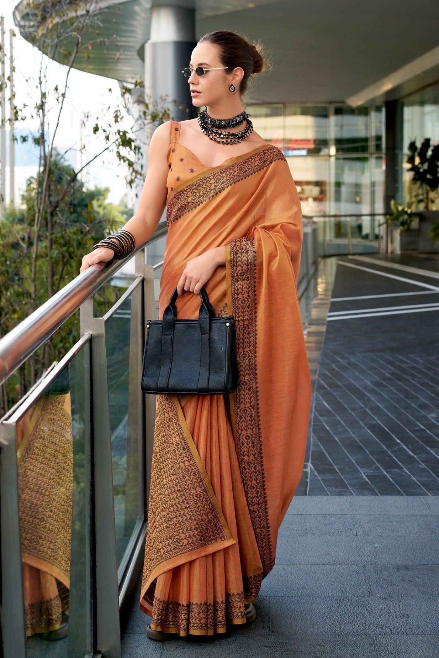 Tiget Orange Linen Tissue Silk Saree