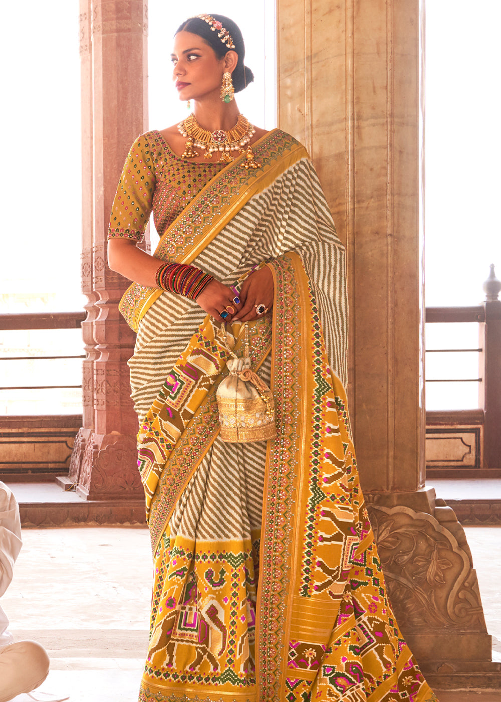 Spicy Mix Yellow and White  Woven Patola Saree