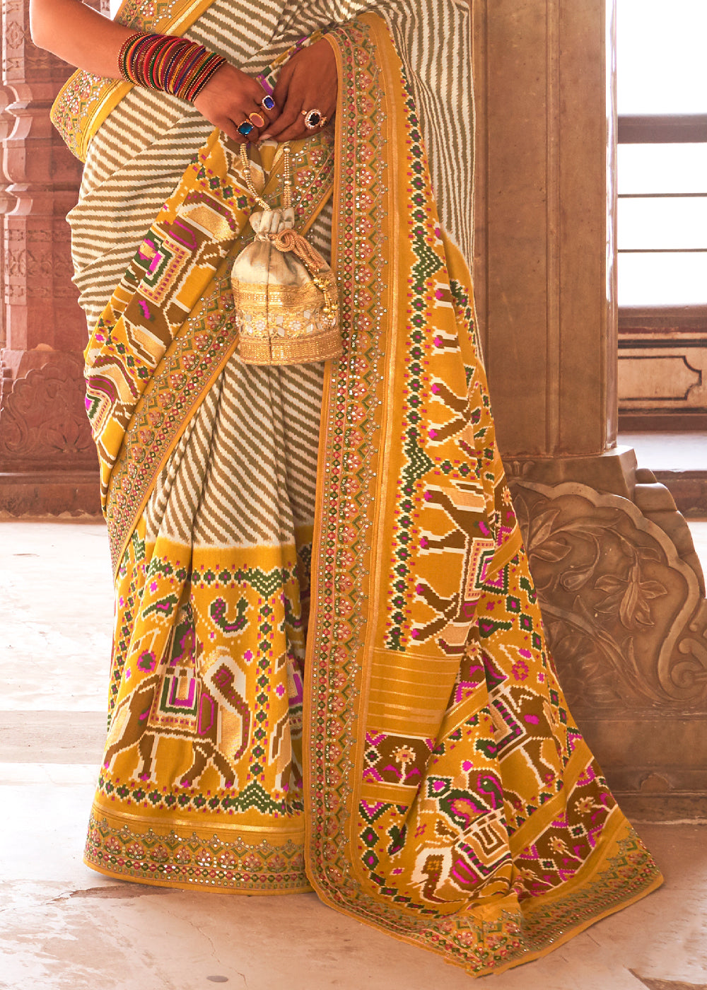 Spicy Mix Yellow and White  Woven Patola Saree