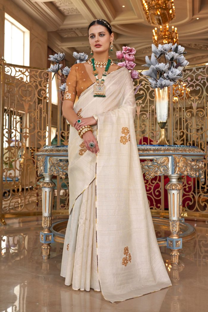 Dust Storm White and Orange Woven Tussar Floral Silk Saree