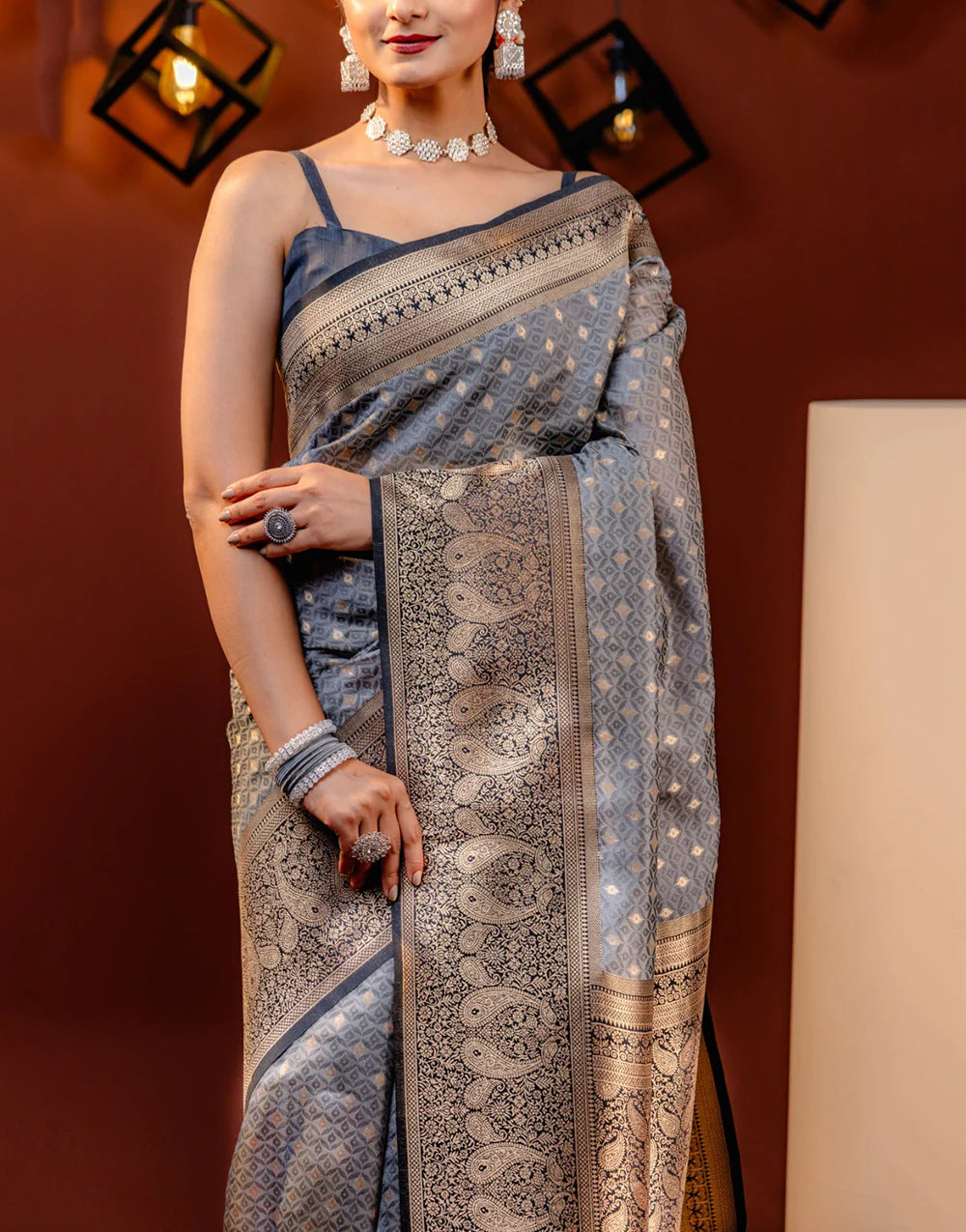 Stone Gray Banarasi Soft Silk Saree With Gold Zari Weaving Work