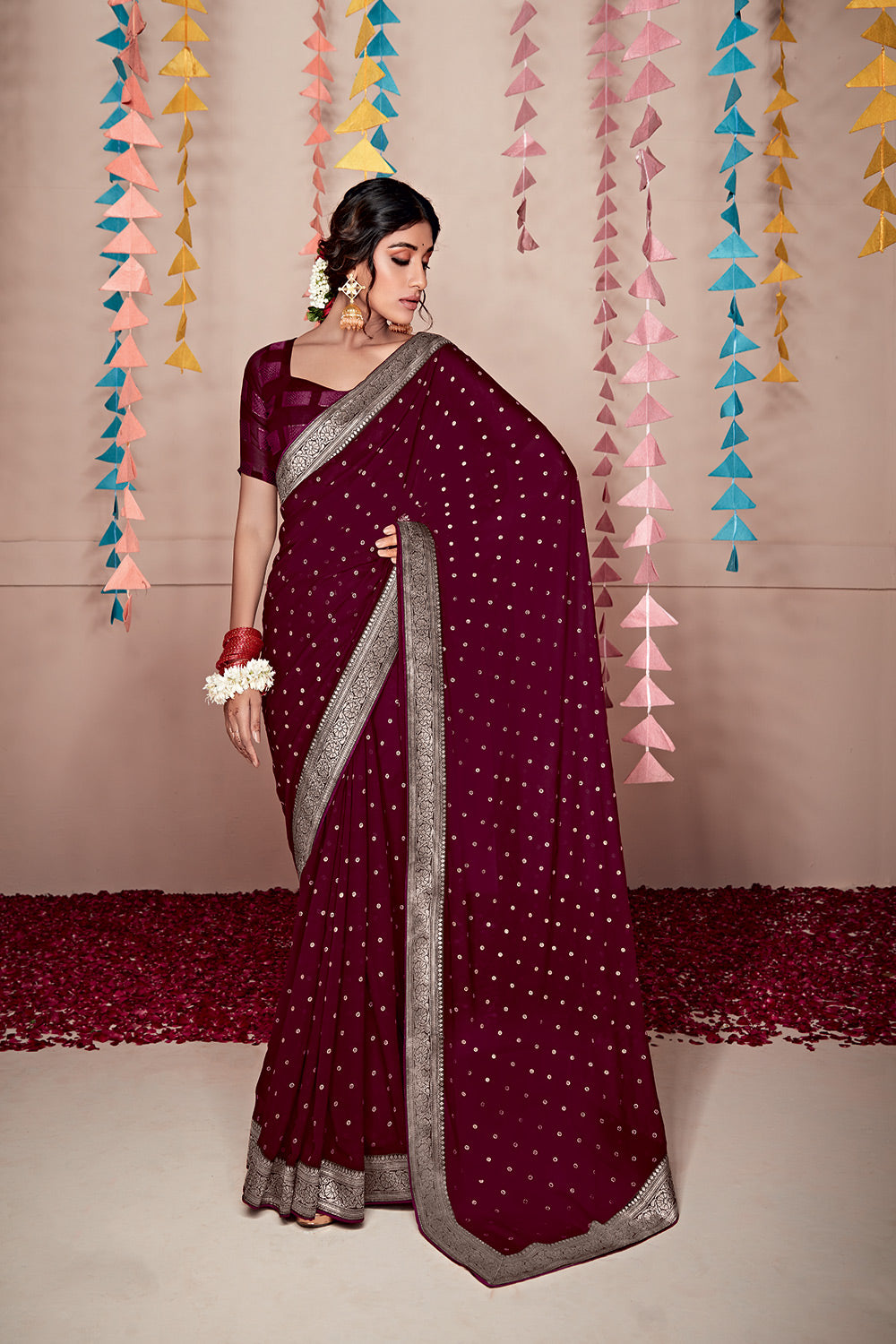 Castro Maroon Woven Georgette Saree