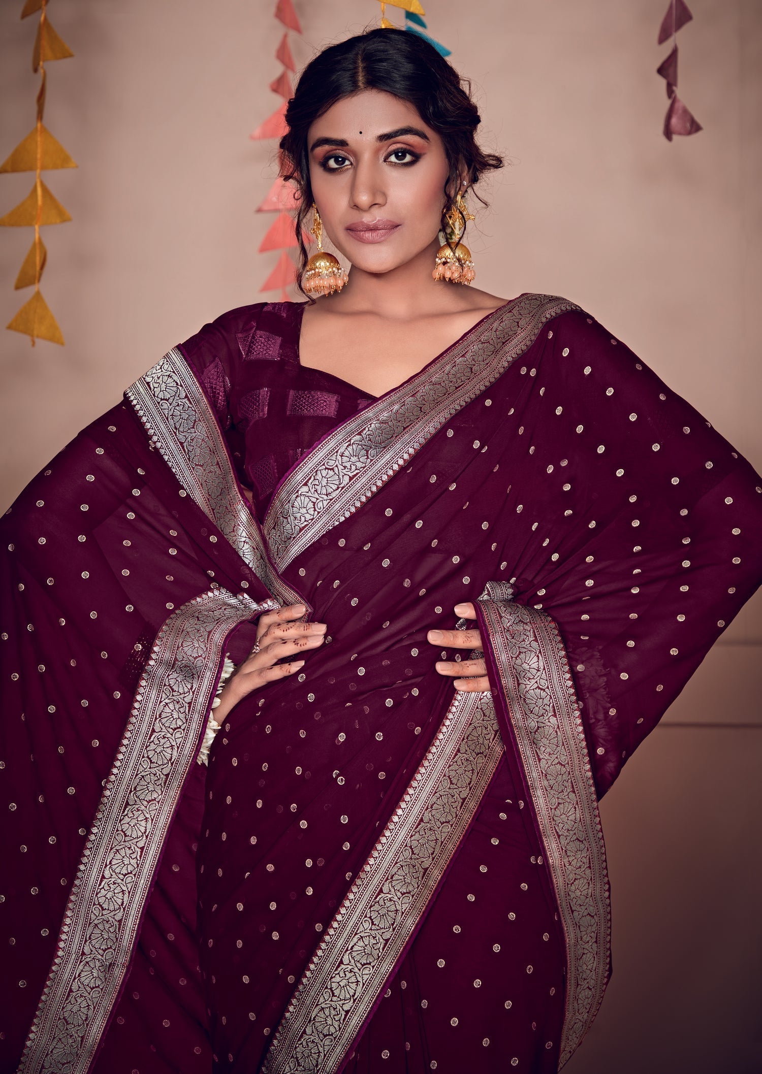 Castro Maroon Woven Georgette Saree