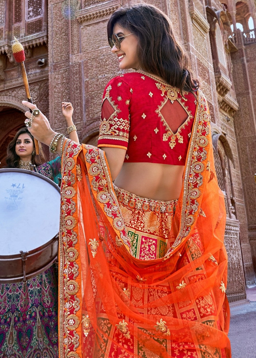 Tia Maria Orange and Red Silk Lehenga Choli