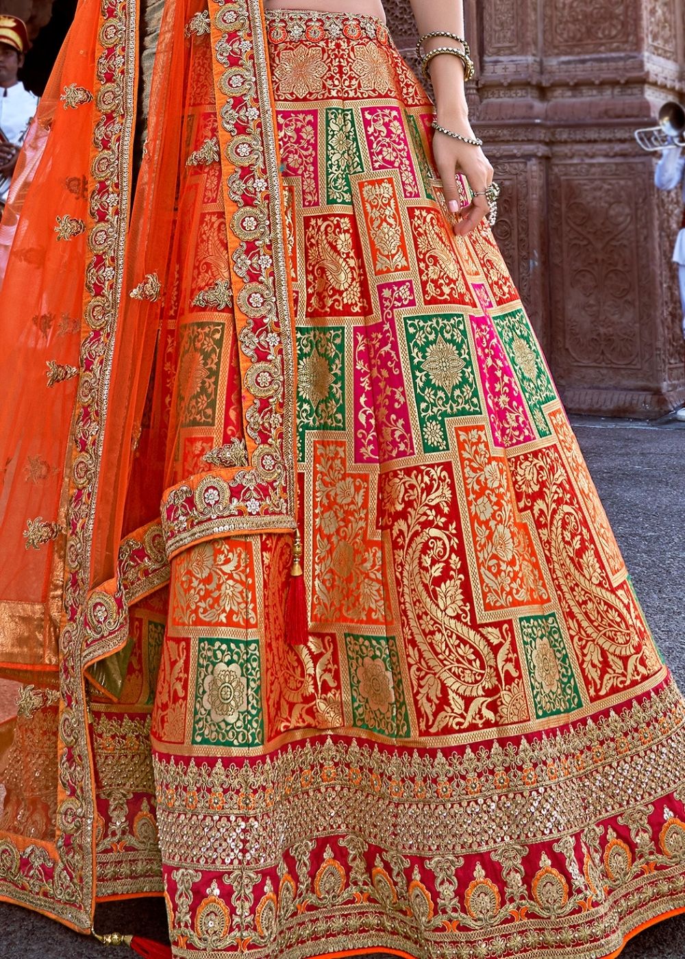 Tia Maria Orange and Red Silk Lehenga Choli