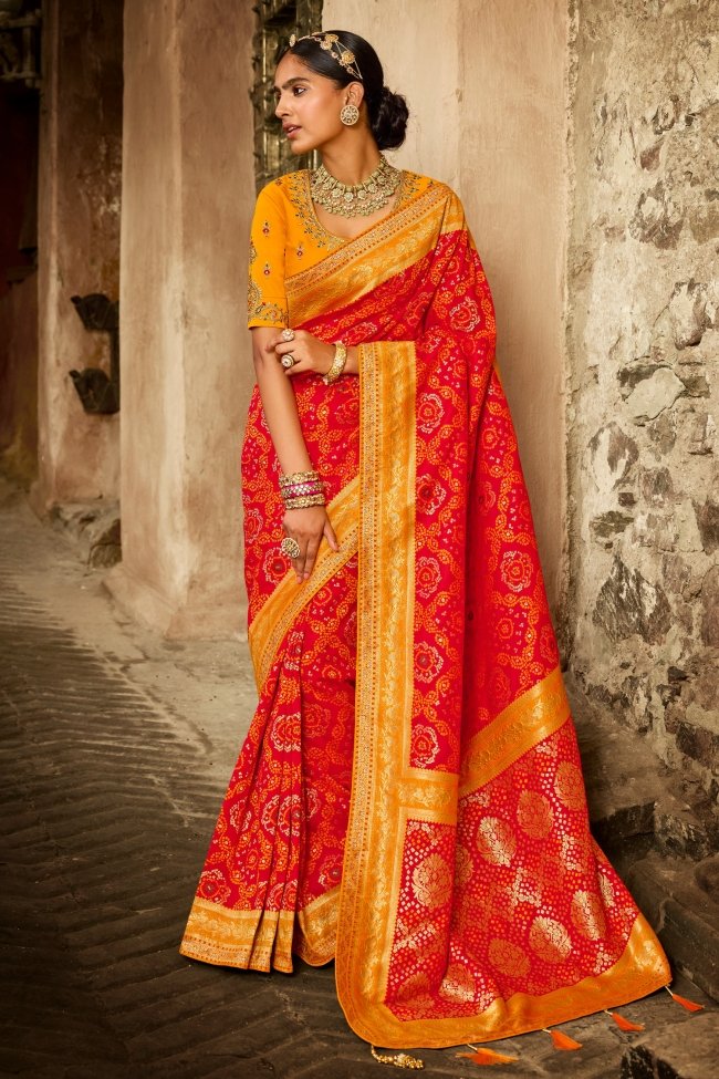 Cinnabar Red and Yellow Zari Woven Designer Banarasi Saree