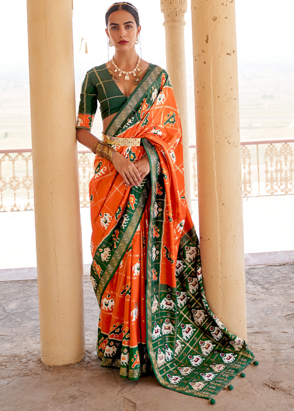 Serria Orange and Green Printed Patola Silk Saree