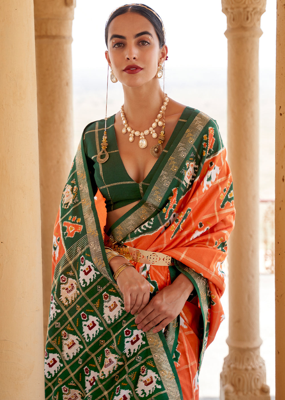 Serria Orange and Green Printed Patola Silk Saree