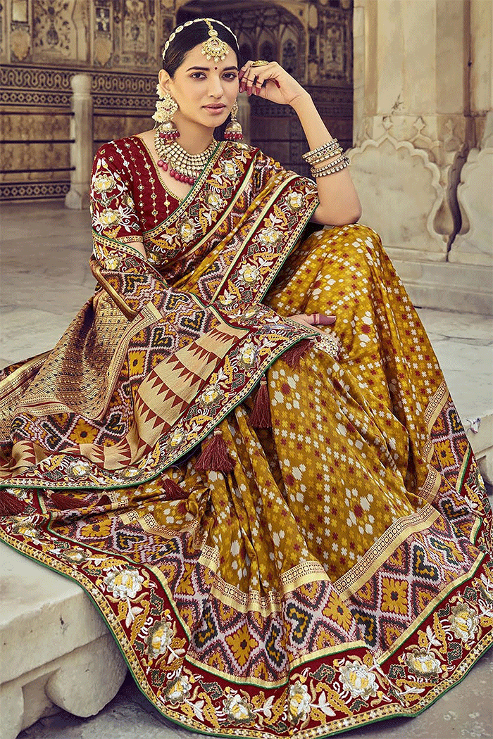 Marigold Yellow and Brown Zari Woven Bandhej Patola Saree With Designer Blouse