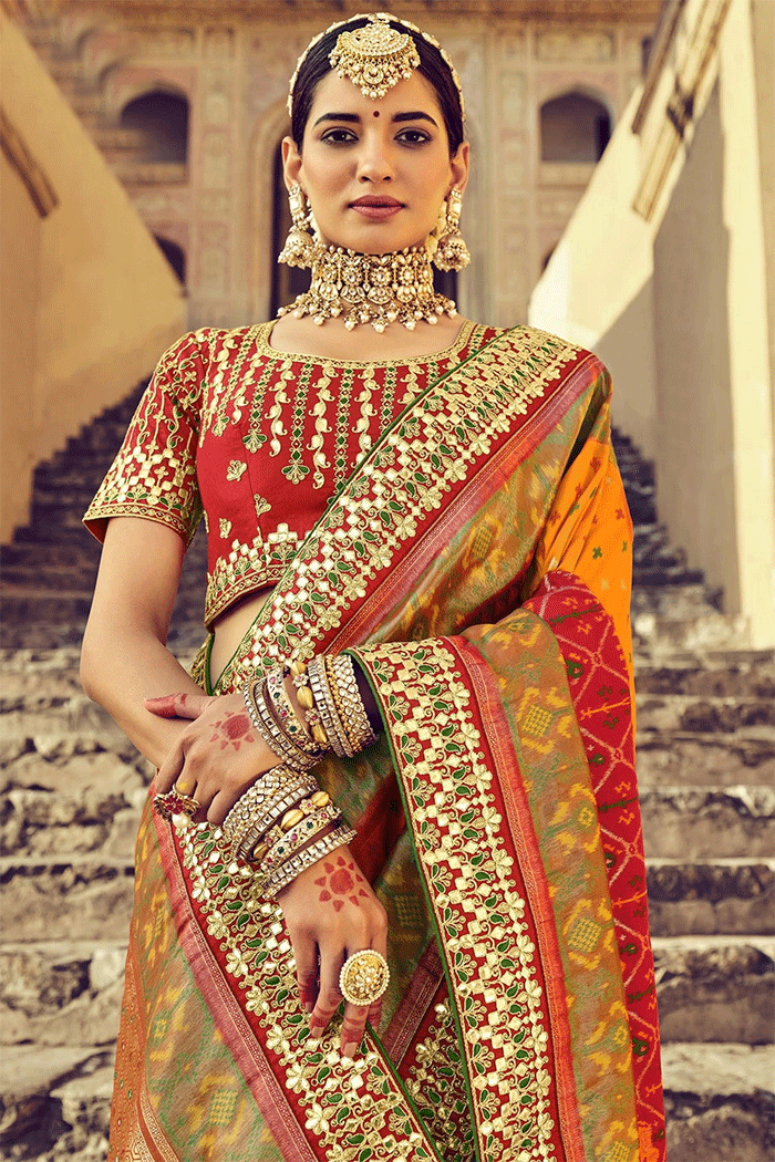 Casablanca Orange and Red Zari Woven Patola Saree With Designer Blouse