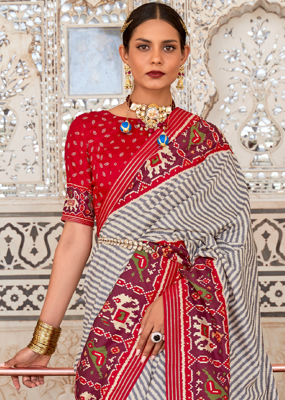 Bizarre Red and White Cotton Patola Printed Saree