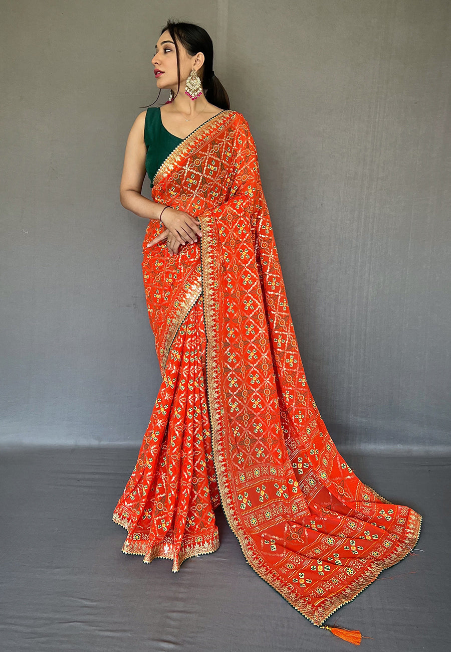 Atomic Orange Embroidered Georgette Bandhani Saree