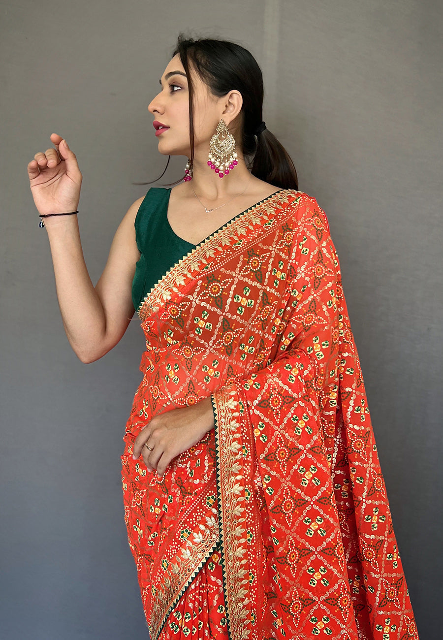 Atomic Orange Embroidered Georgette Bandhani Saree