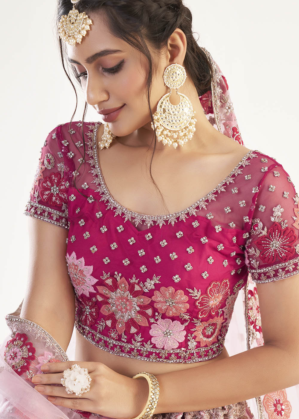 Cinnamon Pink Net Designer Lehenga Choli