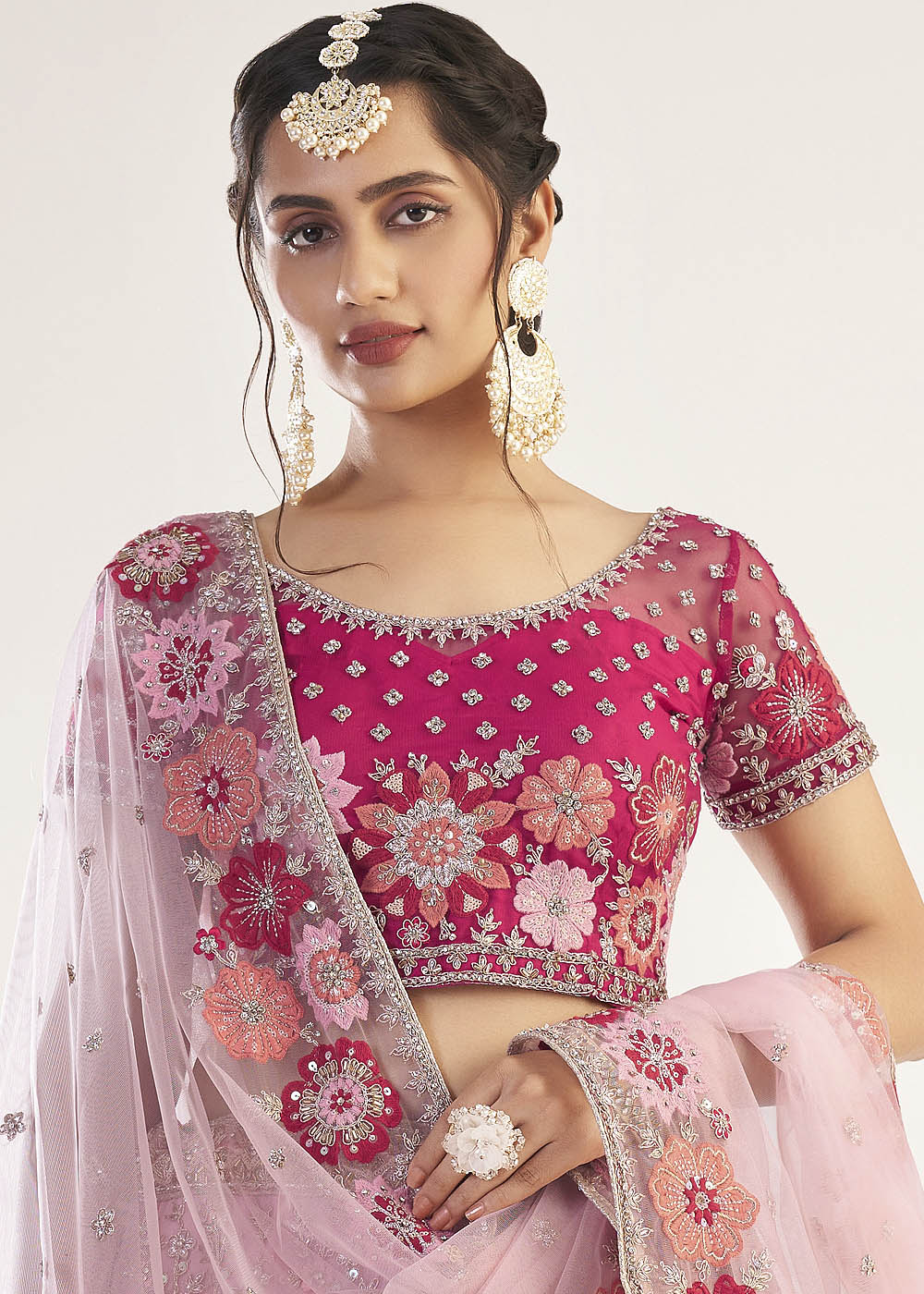 Cinnamon Pink Net Designer Lehenga Choli