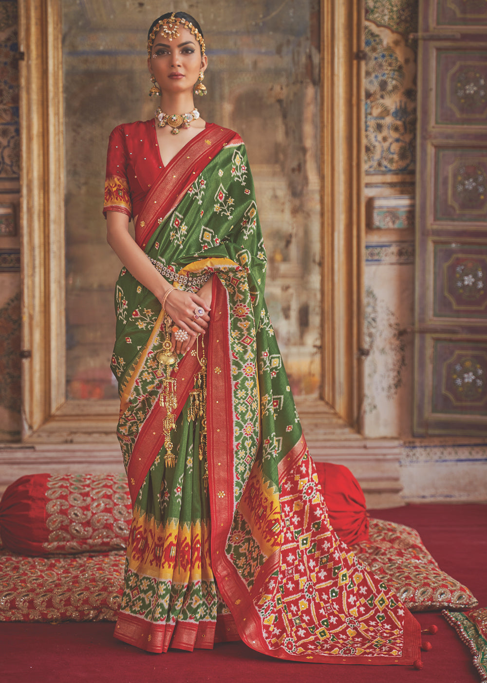 Hemlock Green and Red Woven Patola Silk Saree