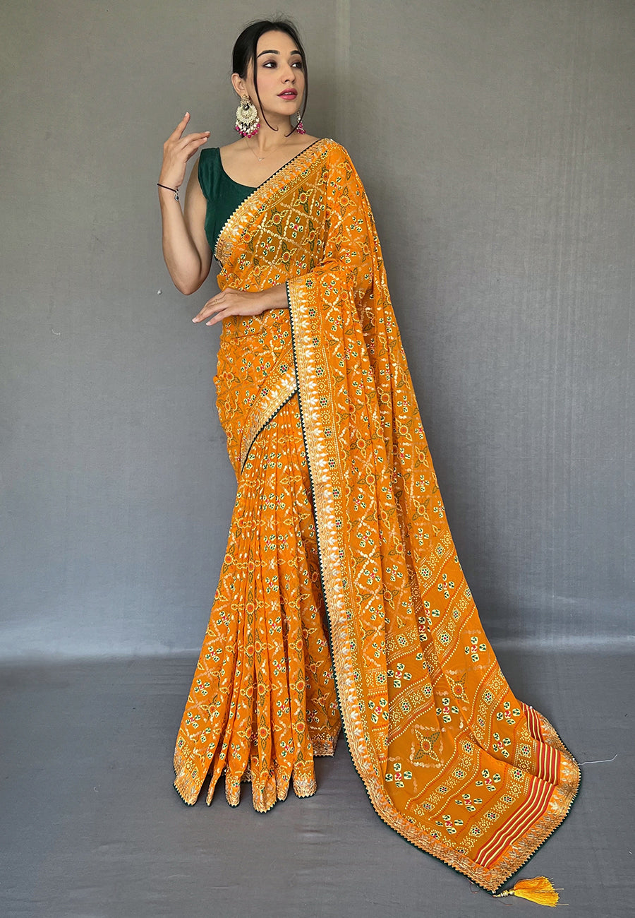 Fire Bush Orange Embroidered Georgette Bandhani Saree