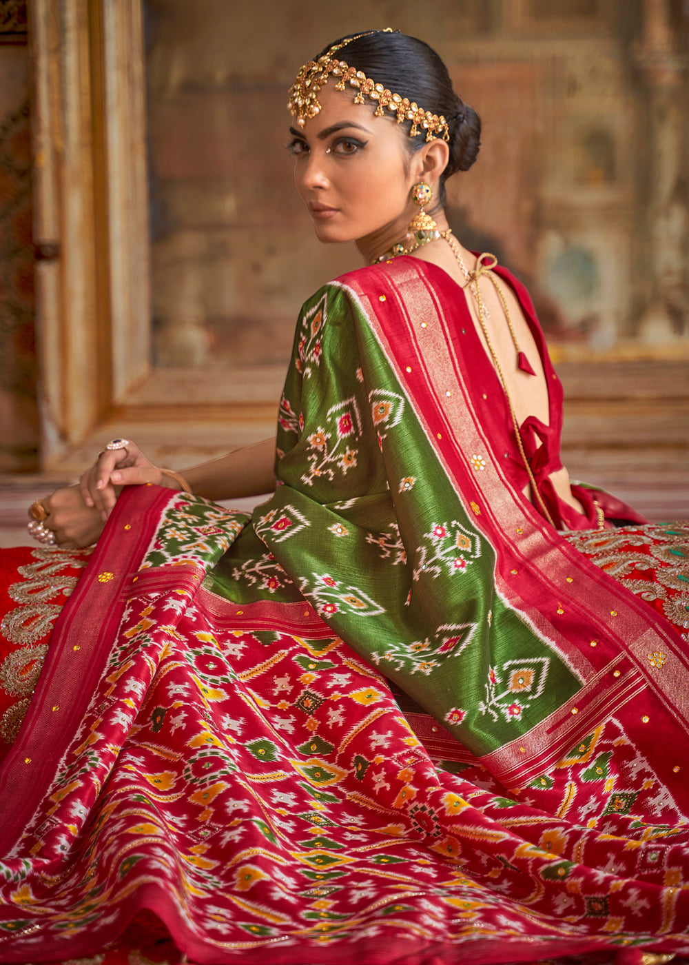 Hemlock Green and Red Woven Patola Silk Saree