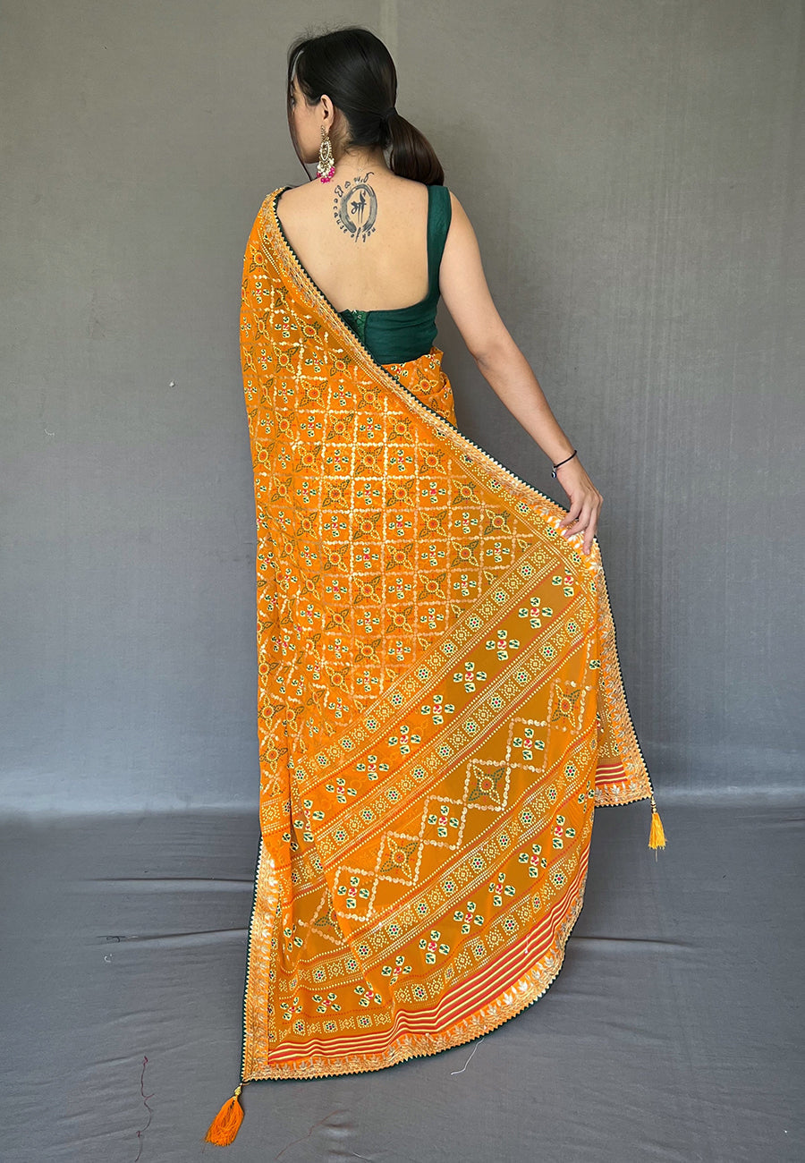 Fire Bush Orange Embroidered Georgette Bandhani Saree