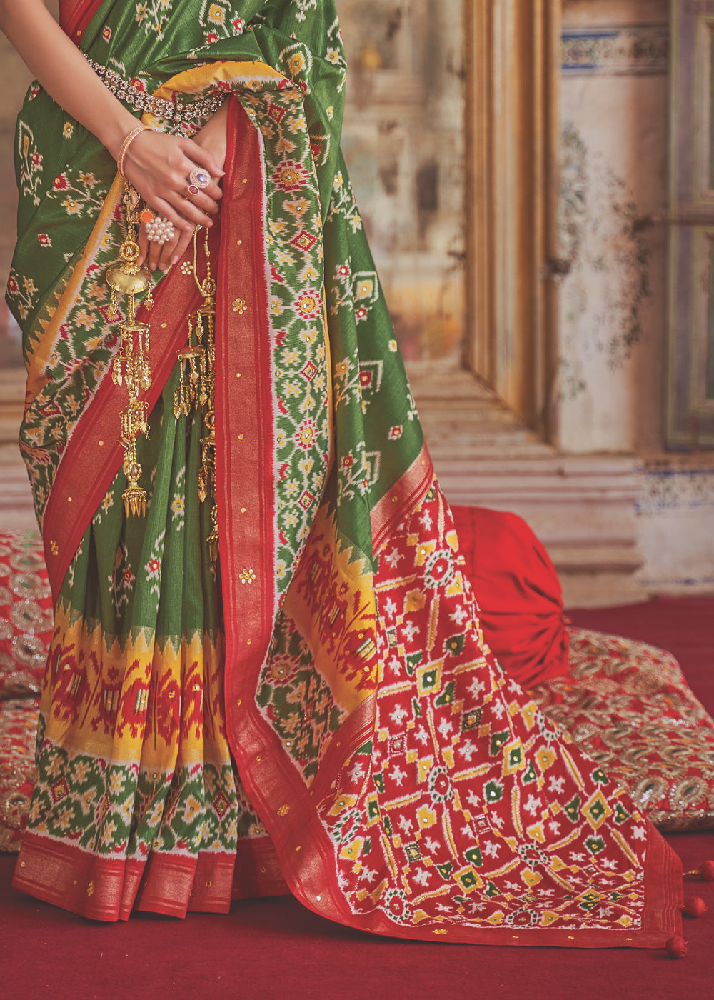 Hemlock Green and Red Woven Patola Silk Saree