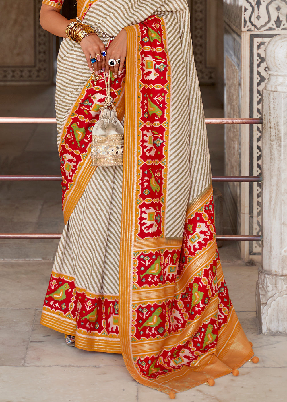 Cameo White and Orange Cotton Patola Printed Saree