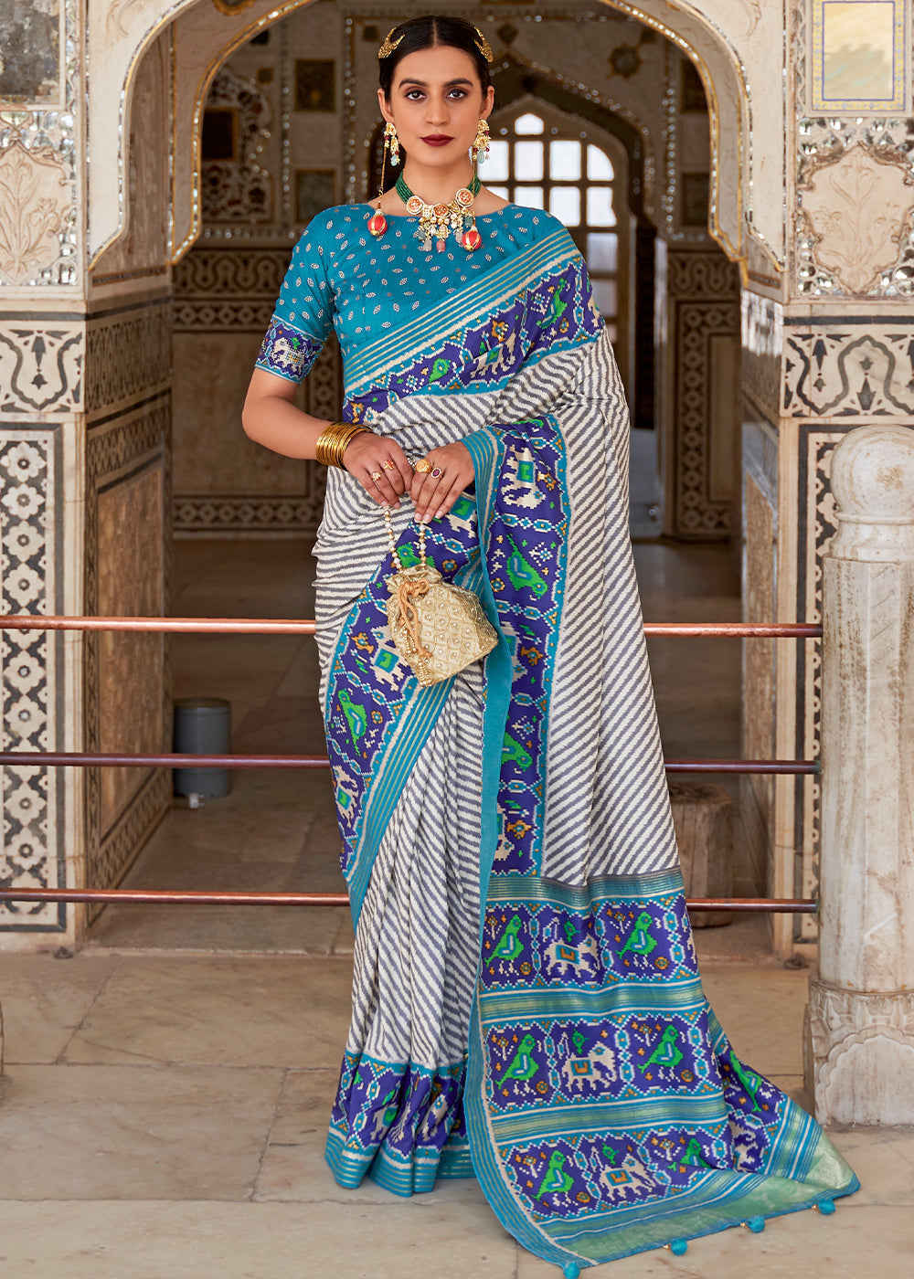 Geyser White and Blue Cotton Patola Printed Saree