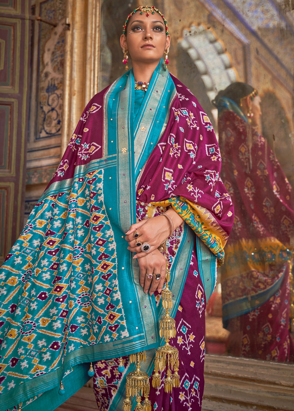 Tawny Port Pueple and Blue Woven Patola Silk Saree