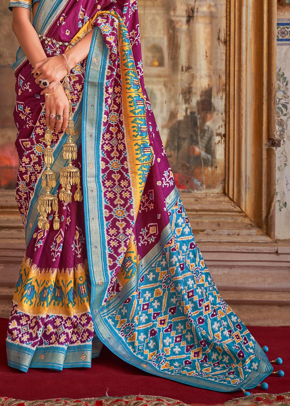 Tawny Port Pueple and Blue Woven Patola Silk Saree