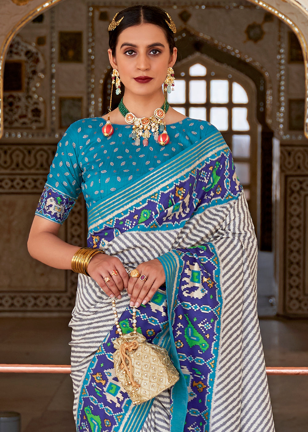 Geyser White and Blue Cotton Patola Printed Saree