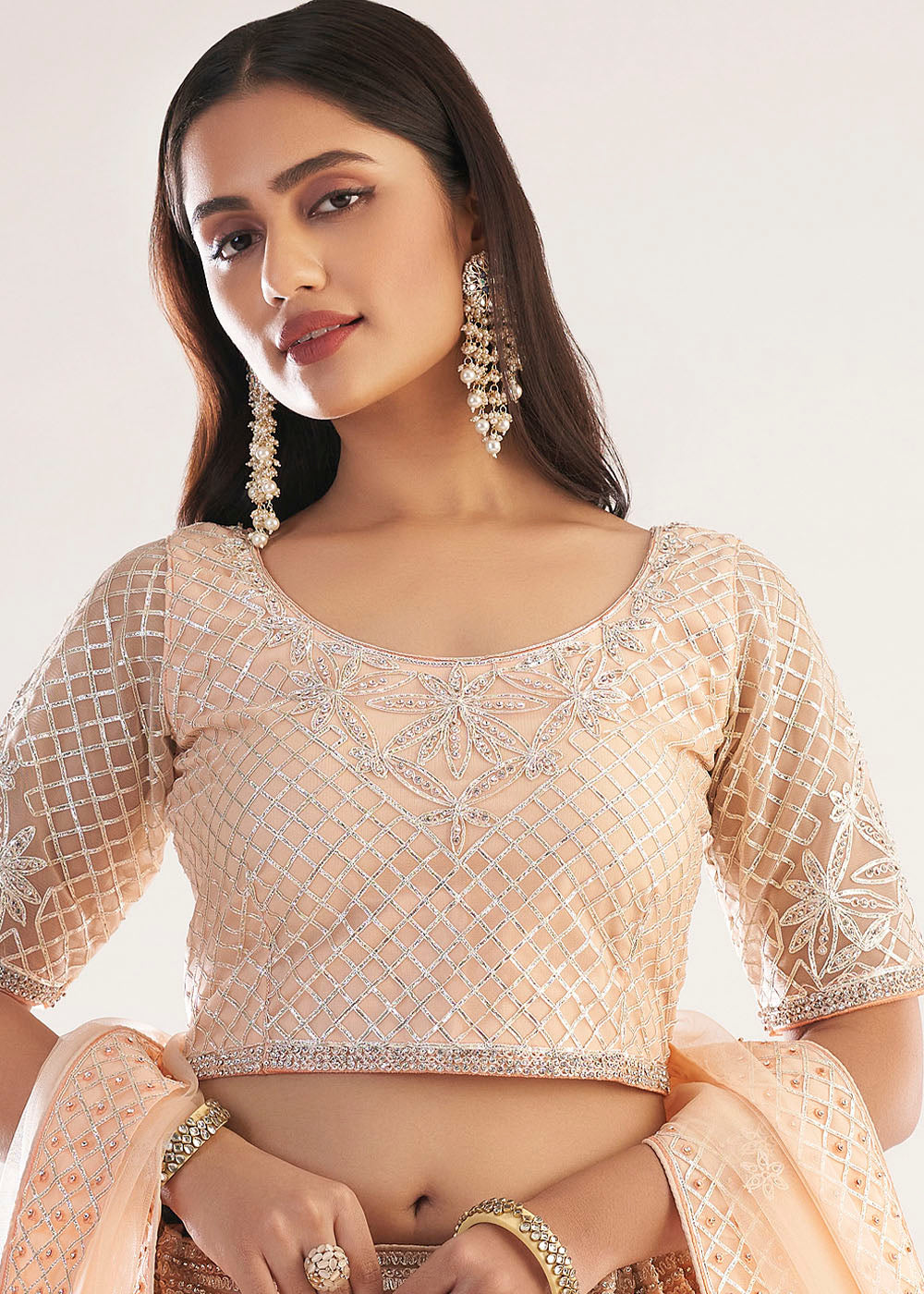 Manhattan Peach Net Designer Lehenga Choli