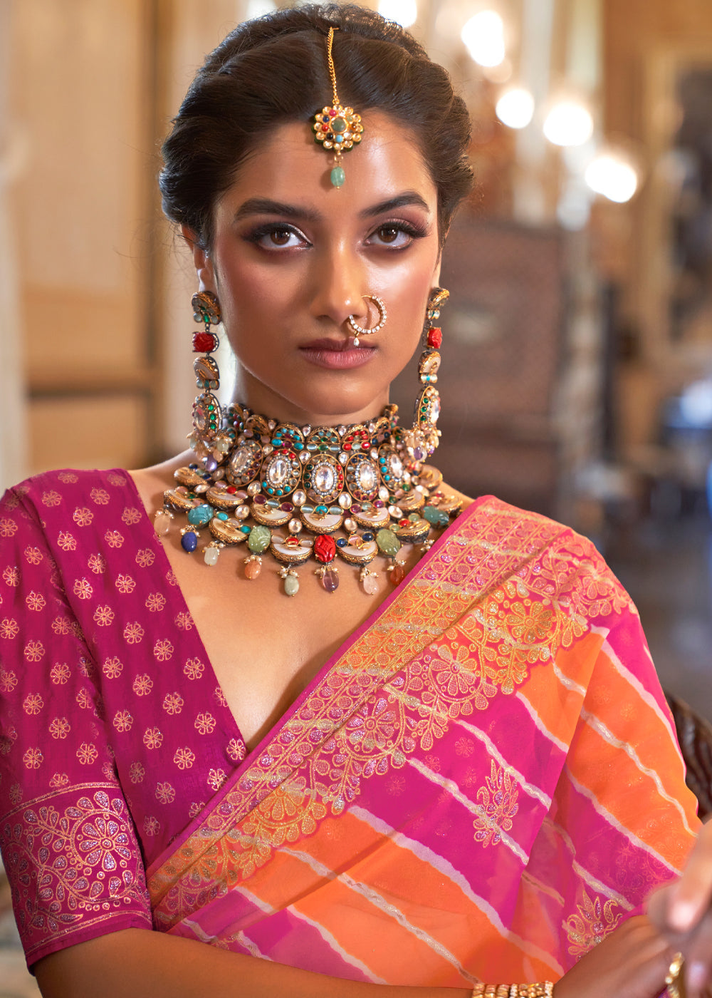 Sunglo Pink and Orange Lehariya Georgette Silk Saree