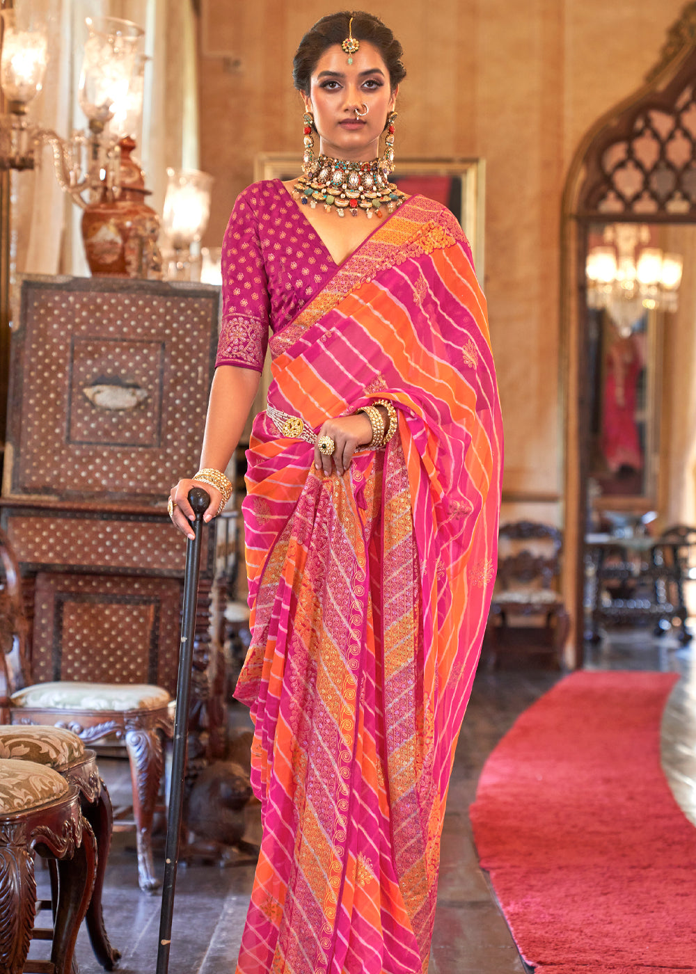 Sunglo Pink and Orange Lehariya Georgette Silk Saree