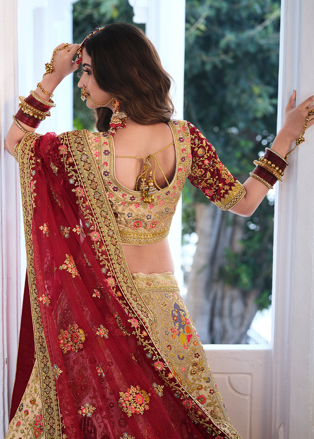 Twine Brown and Maroon Heavy Embroidered Velvet Lehenga