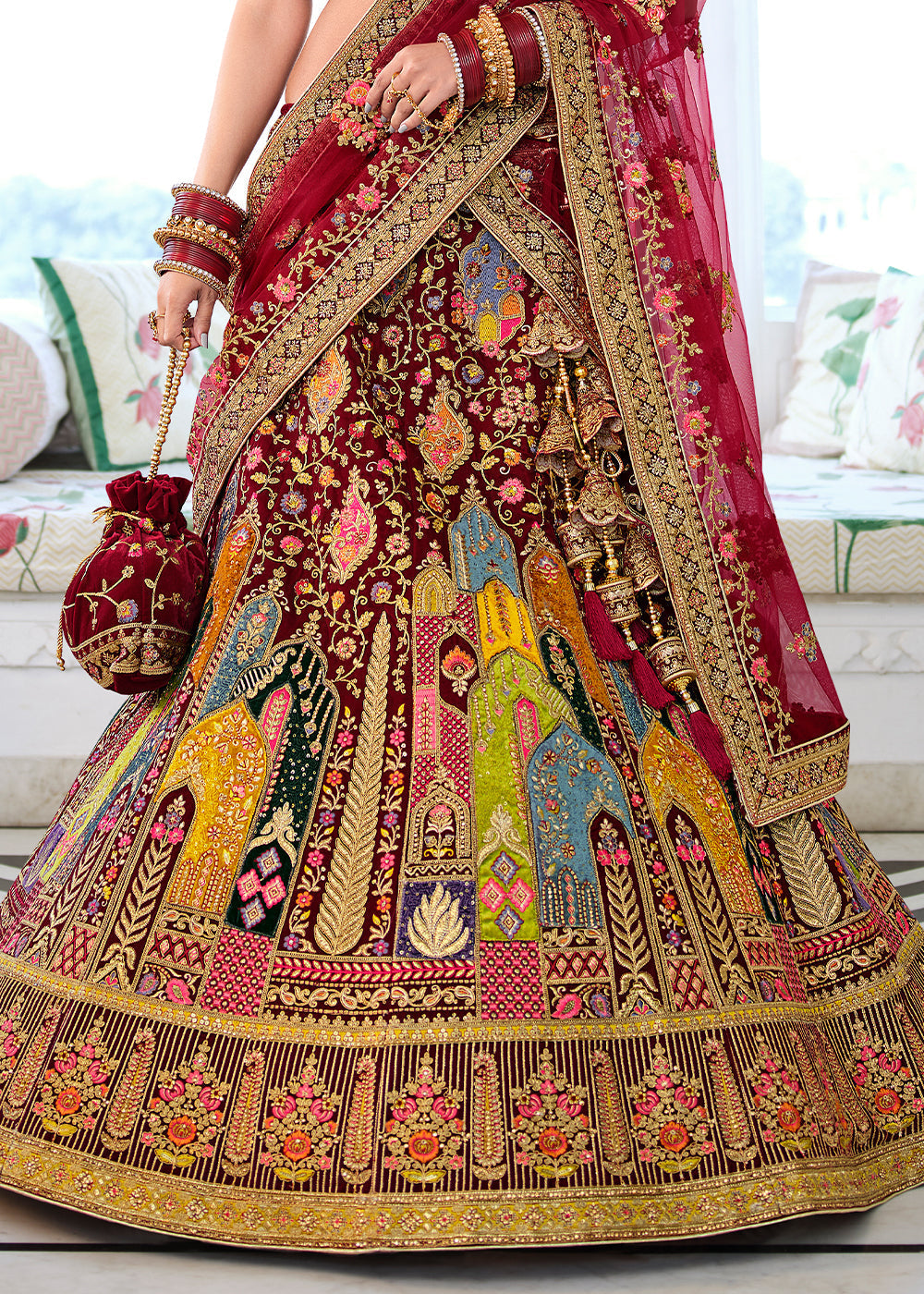 Burnt Umber Maroon Heavy Embroidered Velvet Lehenga