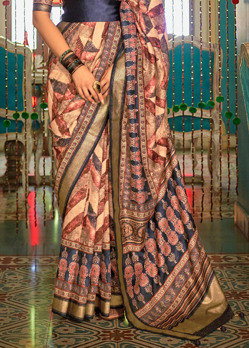 Calico Cream and Blue Printed Patola Soft Silk Saree