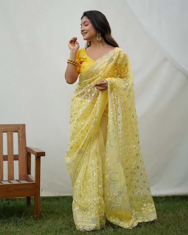 Tacha Yellow Designer Organza saree with Sequence Work