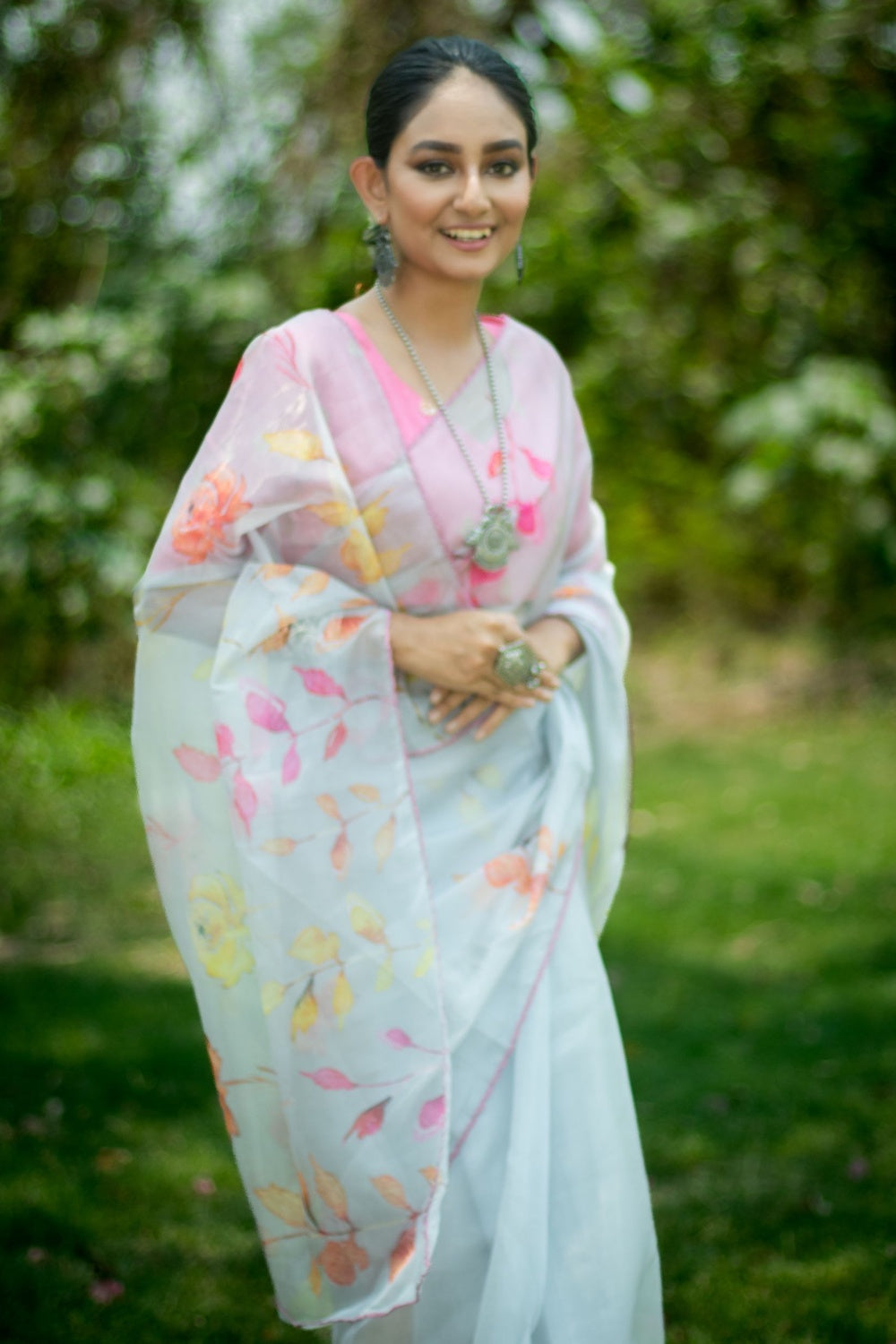 Geyser Blue and Pink Floral Design Organza Printed Saree