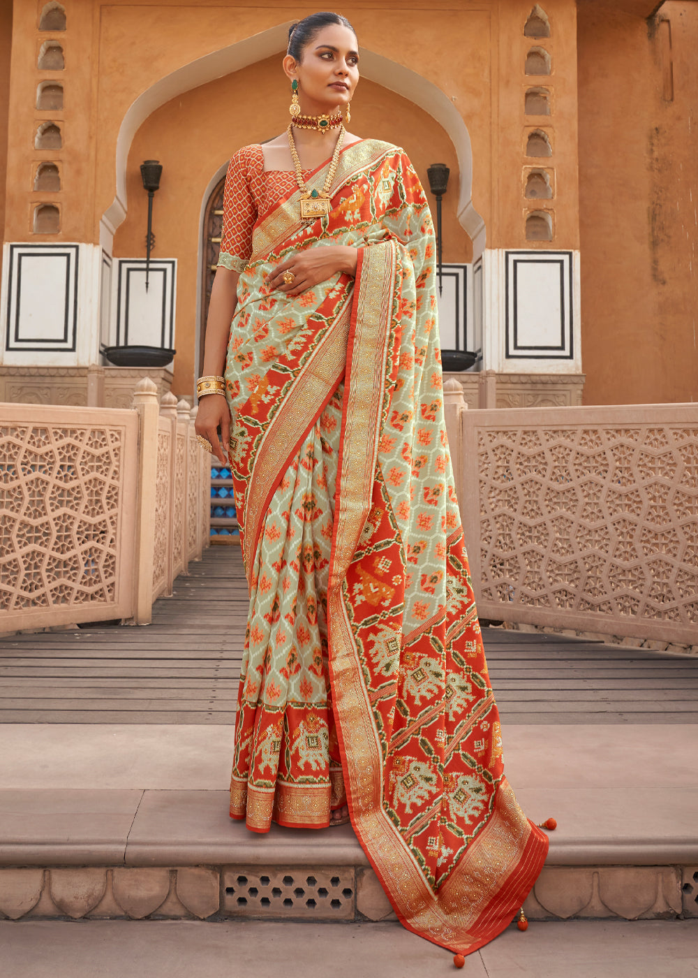 Raffia Cream Printed Patola Silk Saree