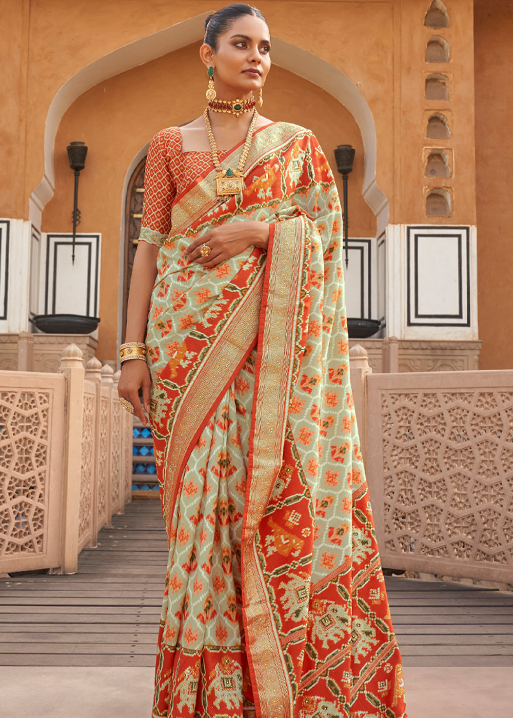 Raffia Cream Printed Patola Silk Saree