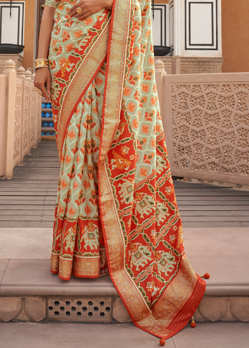 Raffia Cream Printed Patola Silk Saree